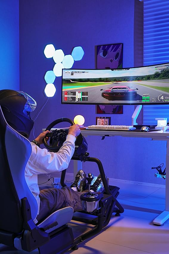 Immersive gaming setup with an ultrawide monitor and racing simulator